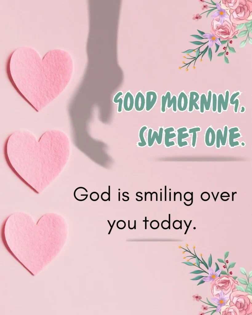 Inspirational Good Morning Christian greeting featuring pink hearts and floral accents with the uplifting message, "God is smiling over you today," expressing love, faith, and hope.